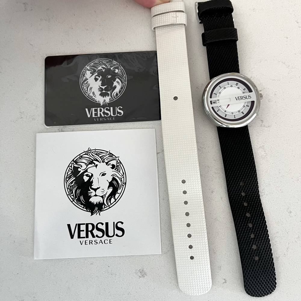 Versus by Versace watch with two leather bands.